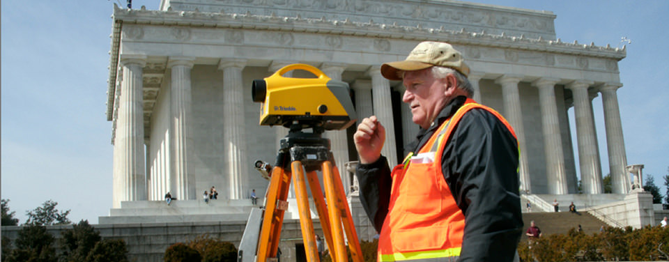 NGS surveyor measures the difference in elevation between two points in front of the Lincoln Memorial in Washington, D.C. NGS surveyor measures the difference in elevation between two points in front of the Lincoln Memorial in Washington, D.C.